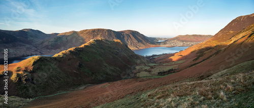 Views of Low Bank, Rannerdale, Mellbreak  andd Crummock Water in the Lake District at sunrise from below Whiteless Pike  in Cumbria, England UK.