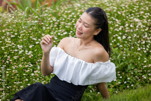 Vibrant flower garden with woman, joyful girl in flower garden, lovely woman lifestyle.