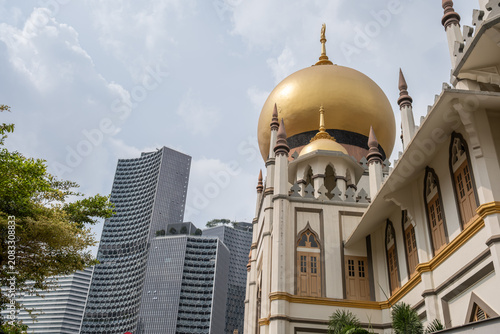 Sultan Mosque Golden dome modern skyscrapers in Haji Lane, Singapore 