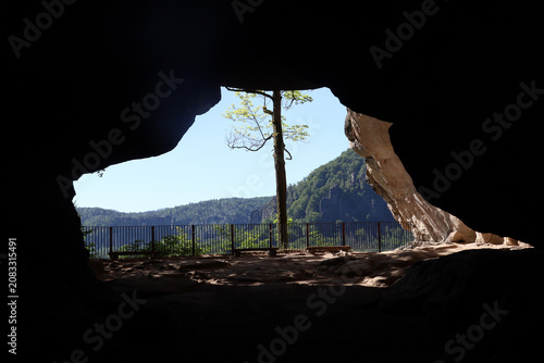 The second largest natural arch in the Elbe Sandstone Mountains called Kuhstall (cowshed), Saxon Switzerland, Germany