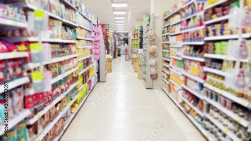 Moving Along the Shelves in a Grocery Store.
