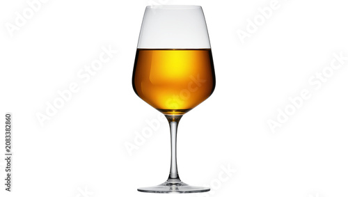 Foto Clear wine glass filled with amber liquid