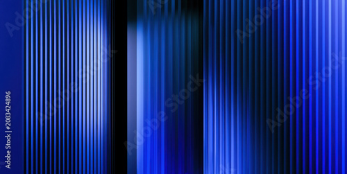 Abstract blue glass texture background with vertical lines ribbed geometric pattern modern architectural design element dark blue shades gradient lighting effect elegant corporate backdrop