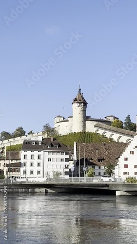 Schaffhausen, Switzerland – October 11, 2025: Sunny views of the Rhine River flowing through the historic city, with recognizable buildings and riverside architecture along the waterfront.