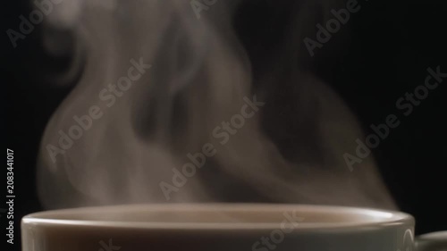 Ultra realistic cinematic footage of hot drink steam swirling upward, macro, no people, 4K UHD