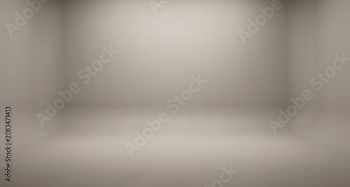 Empty beige studio backdrop with soft gradient lighting and curved floor for product display