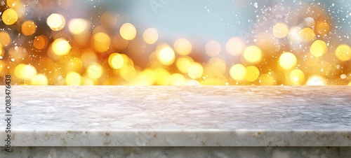 Smooth marble surface before a bokeh background with golden lights and falling snow