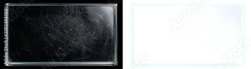 Obraz na plátně Clear glass pane with numerous scratches and scuffs against deep black backgroun