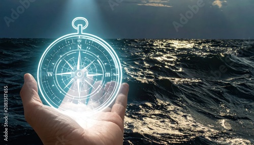 Hand holding glowing compass over stormy ocean waves at dusk.