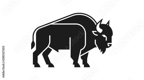 Photos Black silhouette of a bison standing.