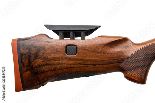 Foto Close-up of a premium rifle wooden buttstock with an orange recoil pad, isolated
