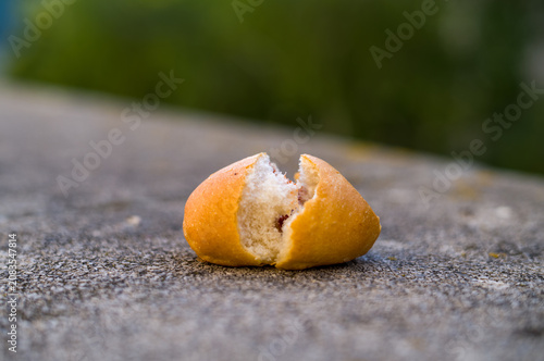 A lonely broken bread roll