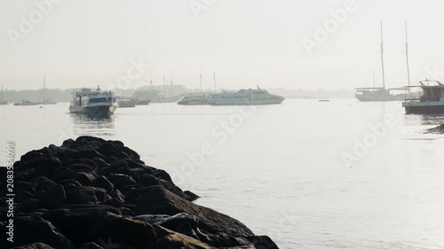 Aerial Sunrise View of Bali Coast with Fishing Boats and Small Harbor