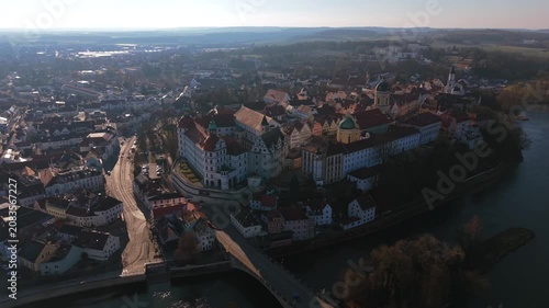 Scenic aerial vista over the historical Karlsplatz square in Neuburg an der Donau displaying the impressive architectural icon of Hofkirche palace church in Upper Bavaria