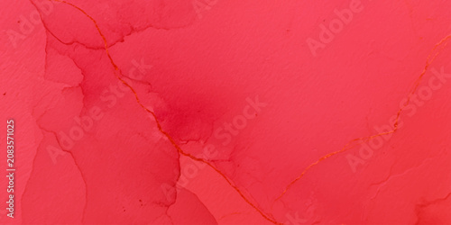 Abstract rich magenta pink and crimson alcohol ink bleeding wash fluid texture with golden accent lines for elegant creative background design