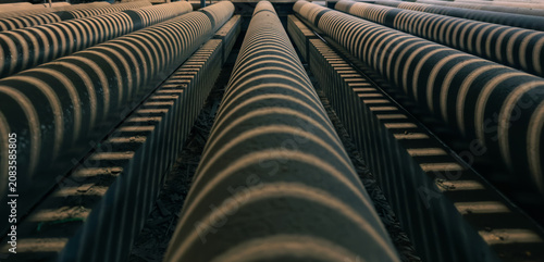 Photos Abstract industrial geometry with parallel production rollers