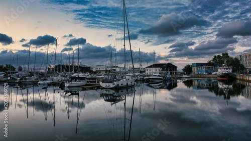 Bild auf Leinwand Beautiful reflection of yachts at Tallinn Admiralty Basin