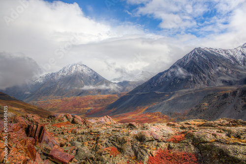 Mountain landscape with mountains and clouds