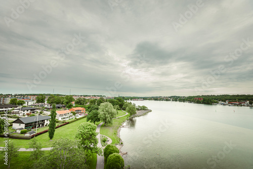 Photography Beautiful scenic view of Sweden landscape with traditional red houses
