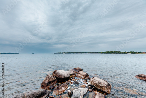 Photography Beautiful scenic view of Sweden landscape with traditional red houses