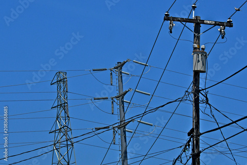 Three generations of high voltage electrical transmission lines 