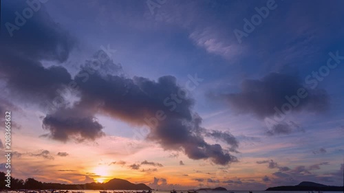 Timelapse stunning the sun shining through the clouds at the horizon.
Scene of colorful yellow light through the clouds above fishing boat.
Gradient color. Sky texture, abstract nature background.