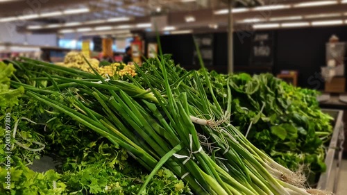 Fresh Green Onions in Grocery Produce Display