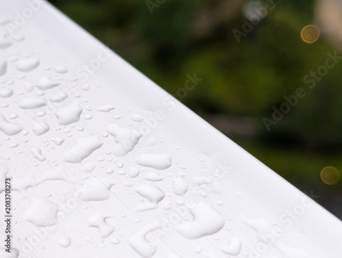 Bild auf Leinwand Raindrop on metal handrail after rain