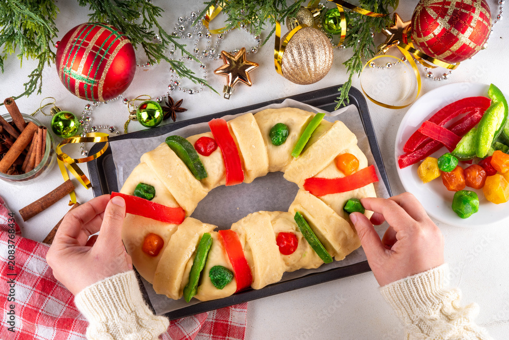 Fototapeta premium Cooking making traditional Christmas Mexican Rosca de Reyes