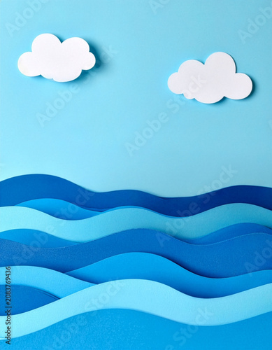 Paper cut style blue ocean waves with white clouds on sky vertical background