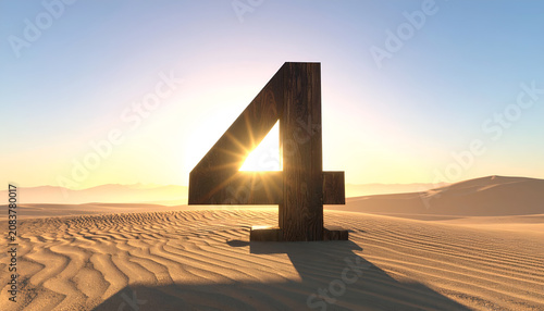 Giant Number Four Sculpture in Desert Landscape at Sunrise.