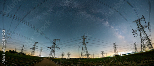 The high voltage tower and the Milky Way at night