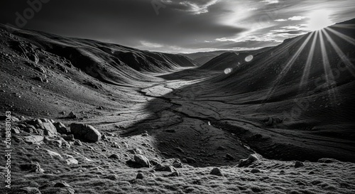 Dramatic Sunlight and Shadow in a Vast Mountain Valley