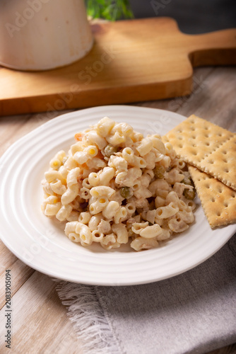 Obraz na plátně Macaroni Tuna salad with elbow pasta and canned tuna, served with saltine crackers