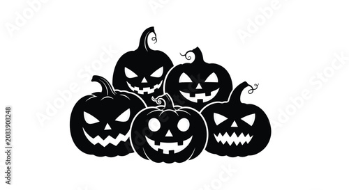 Tableau sur toile Group of spooky carved pumpkins with sinister faces for Halloween celebration