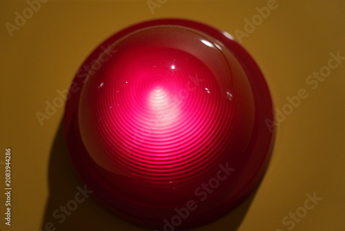 Canvastavla Close up of glowing red fire alarm indicator light