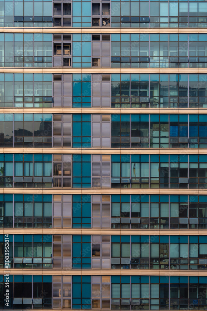Obraz premium Abstract background of modern glass office building facade with geometric pattern