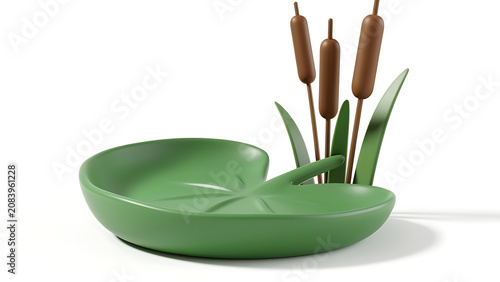 A decorative green lily pad shaped dish with brown cattails and green leaves on a white background.
