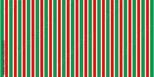 Christmas seamless pattern. Red and green diagonal stripes background. Candy cane repeating decoration wallpaper. modern.