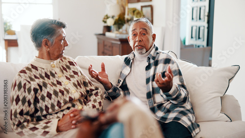 Bild auf Leinwand Old couple, talk and therapist in home for counseling, conflict resolution or tension from argument