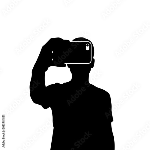 Фотография Person taking a selfie against a simple backdrop