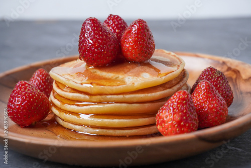 Принти на полотні pancakes with strawberries and honey