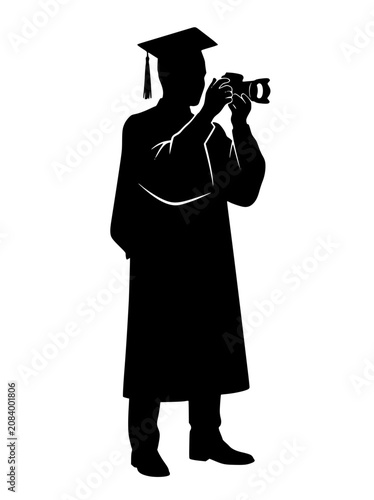 Silhouette of Graduate Student in Gown and Cap Holding a Camera