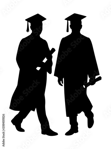 Silhouette of two graduates in gowns and caps walking with diplomas
