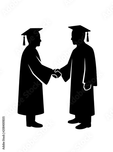 Silhouette of two graduates shaking hands in academic gowns