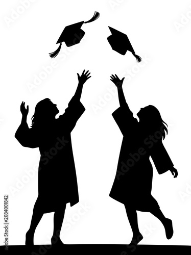 Silhouette of Two Graduates Tossing Caps in the Air