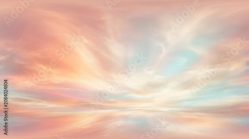 Beautiful sunset sky with soft pastel pink and blue clouds at twilight