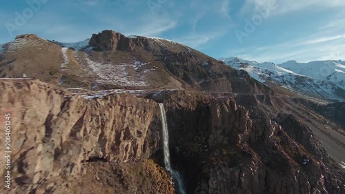 Aerial view of a waterfall in the Andes mountains, Chile
