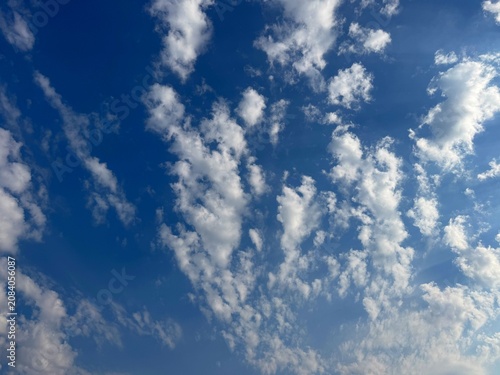 Bild auf Leinwand Blue sky with altocumulus clouds.