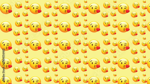 Photos Abstract light yellow background with repeating face blowing kiss emoji pattern